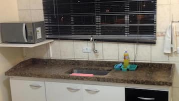 Mini-fridge, microwave, cookware/dishes/utensils
