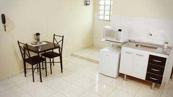 Mini-fridge, microwave, cookware/dishes/utensils