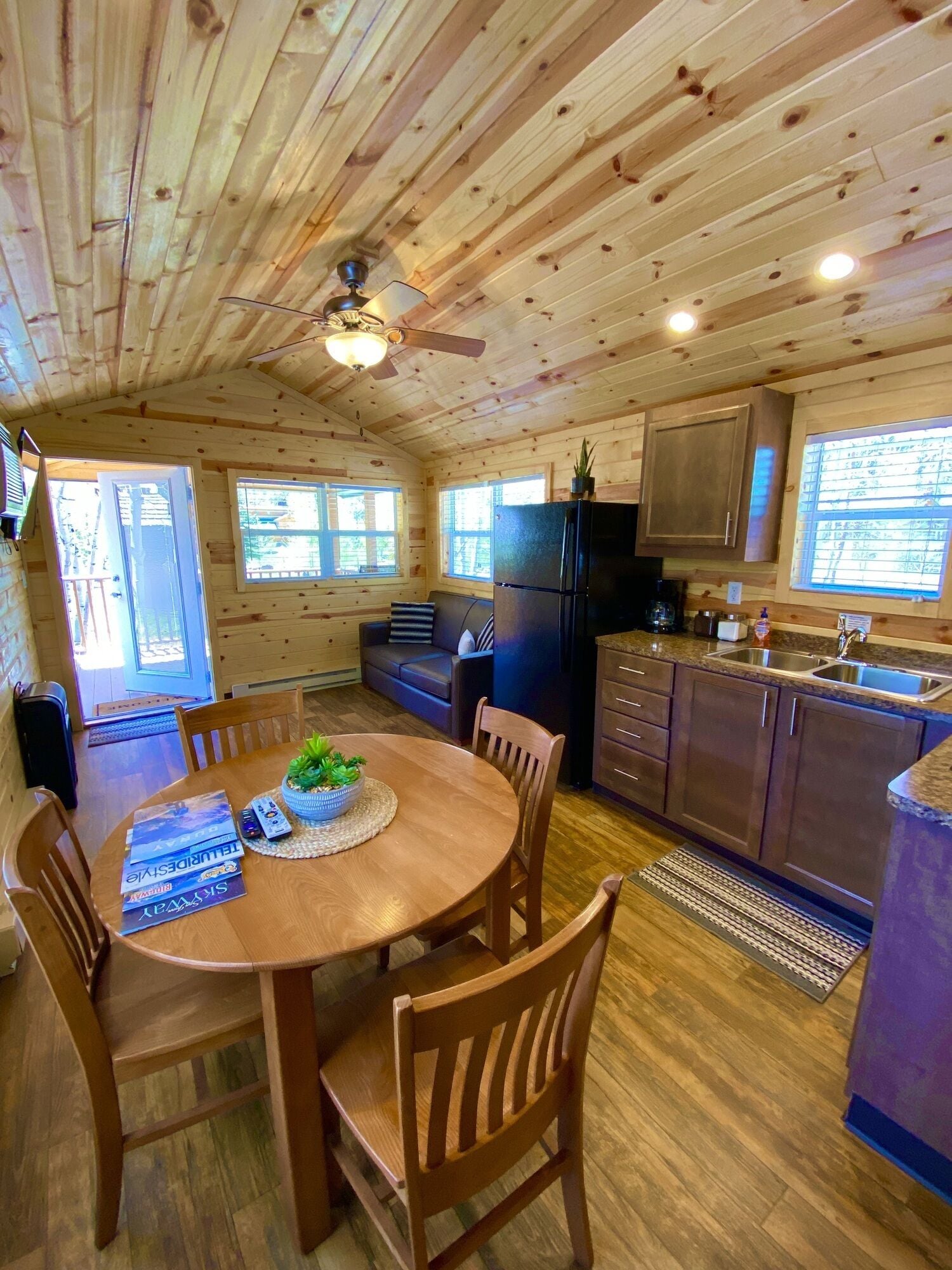 Deluxe Cabin, River View | Living area | 50-inch LED TV with digital channels, TV, streaming services