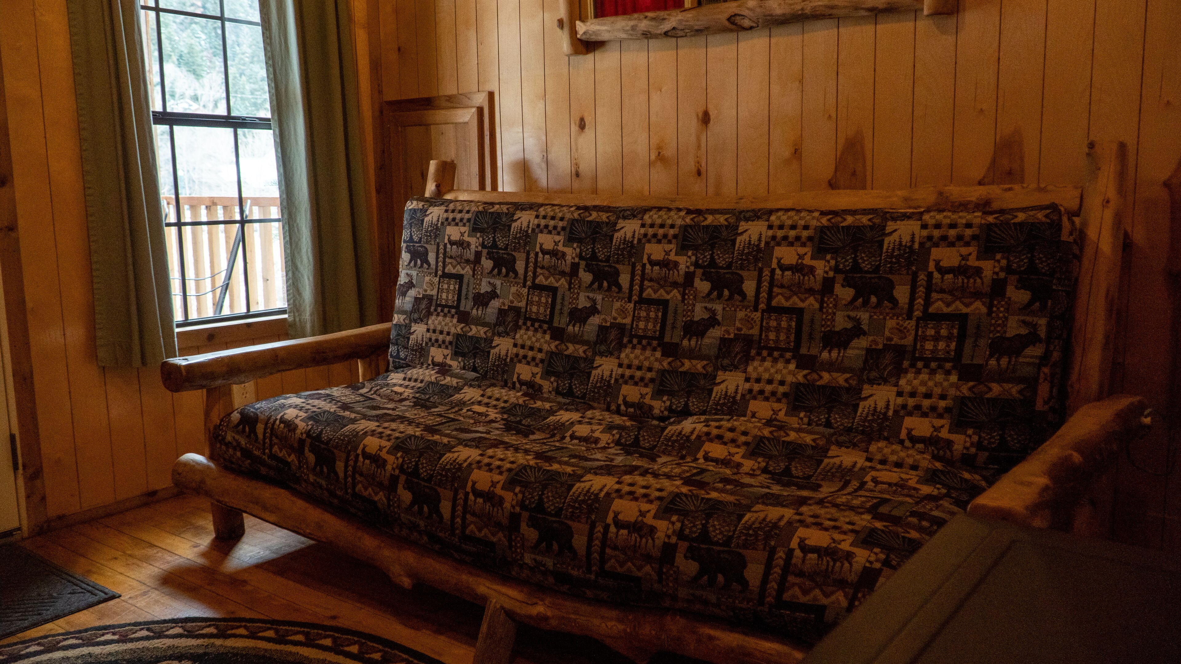 deluxe riverfront cabin "imogene" | living area | 50-inch led tv with digital channels, tv, streaming services