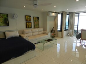 Panoramic Studio, Bathtub, Ocean View | Living area - Alex Group Jomtien Plaza Condotel (Pattaya)