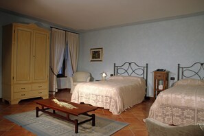 Twin Room, Multiple Beds | In-room safe, desk, soundproofing, cots/infant beds