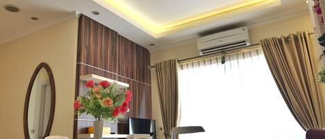 Appartamento, 2 camere da letto | Area soggiorno | TV LED 32 pollici con canali via cavo, lettore DVD