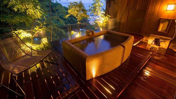 A wooden deck with a hot tub, a glass balustrade, and a chair. - wa-tei Kazekomichi (Atami)
