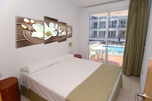 Apartment, 2 Bedrooms | Blackout drapes, iron/ironing board, free cribs/infant beds, WiFi - Arena Suites (Santiago del Teide)