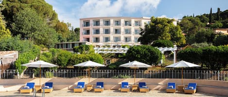 Outdoor pool, open 8:00 AM to 8:00 PM, pool umbrellas, pool loungers