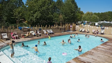 Seasonal outdoor pool, open 10:00 AM to 8:30 PM, pool umbrellas