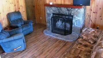 Cabin, 1 Bedroom (White Fir) | Living room | 32-inch flat-screen TV with cable channels, TV, fireplace