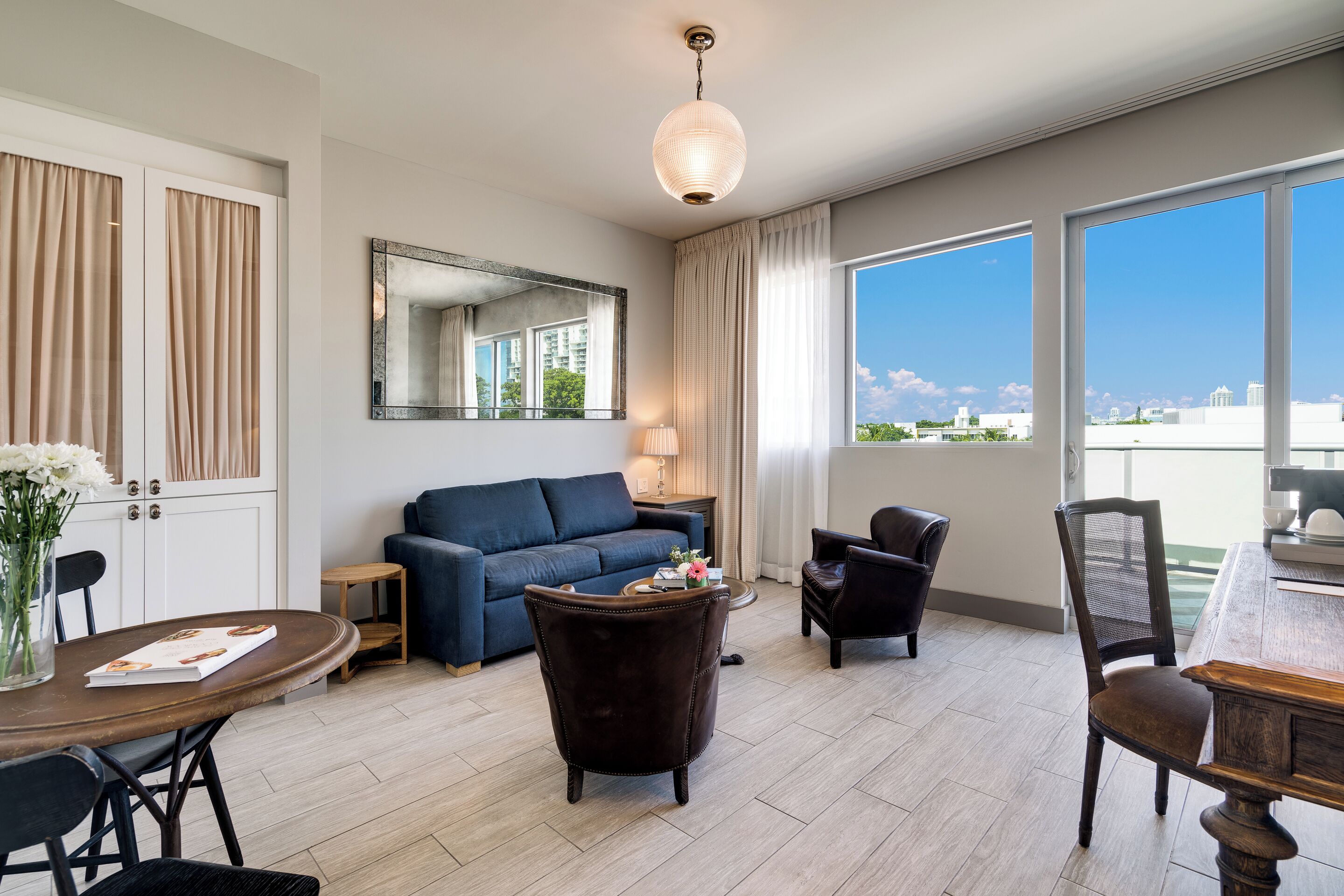 suite, 1 bedroom, balcony | living area | 48-inch flat-screen tv with satellite channels, tv, pay films