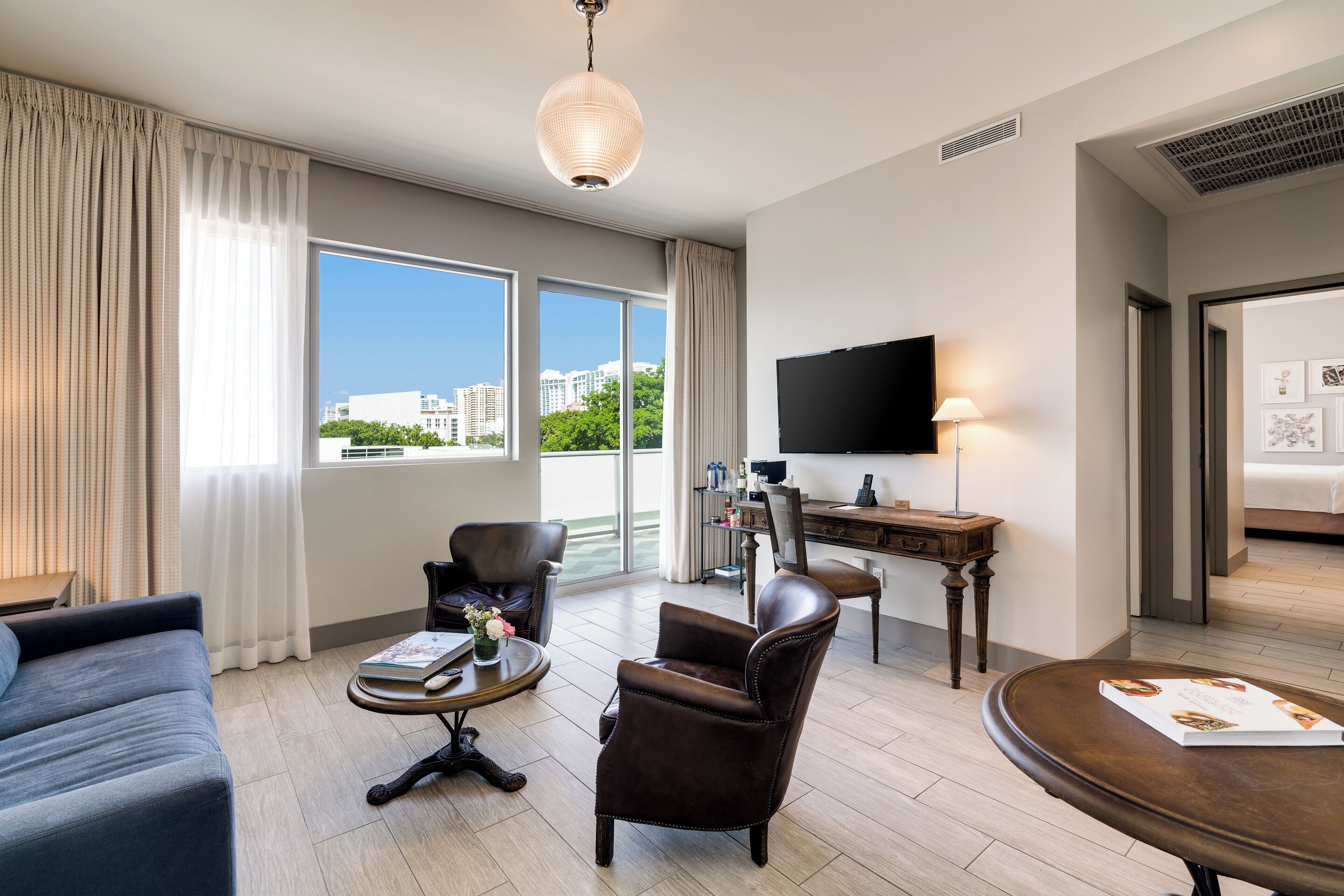 suite, 1 bedroom, balcony | living area | 48-inch flat-screen tv with satellite channels, tv, pay films