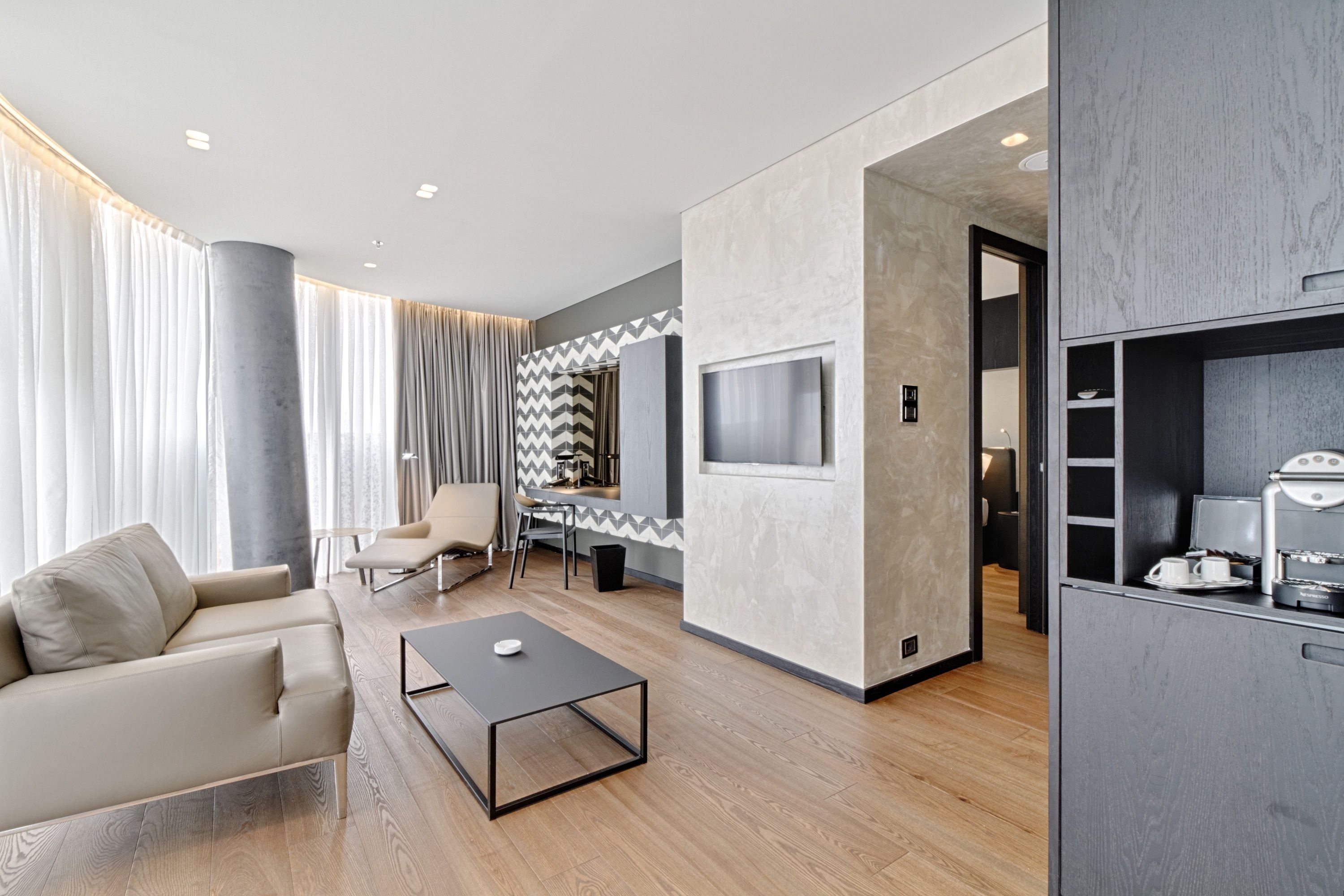 executive suite, 1 bedroom, city view, tower | living area | flat-screen tv