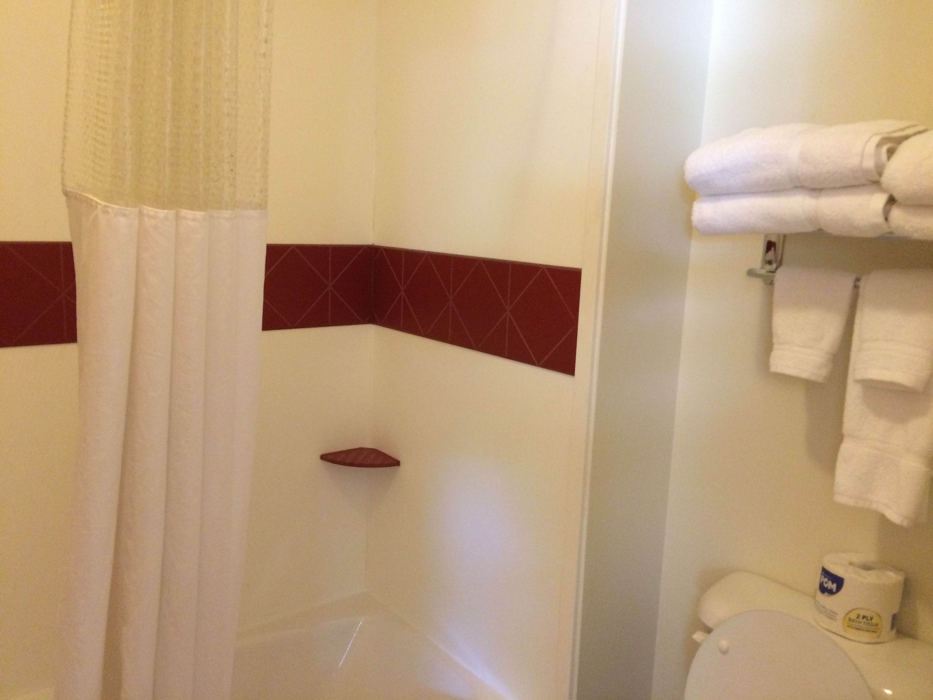 signature double room, 2 queen beds, kitchenette | bathroom | combined shower/bathtub, free toiletries, hair dryer, towels