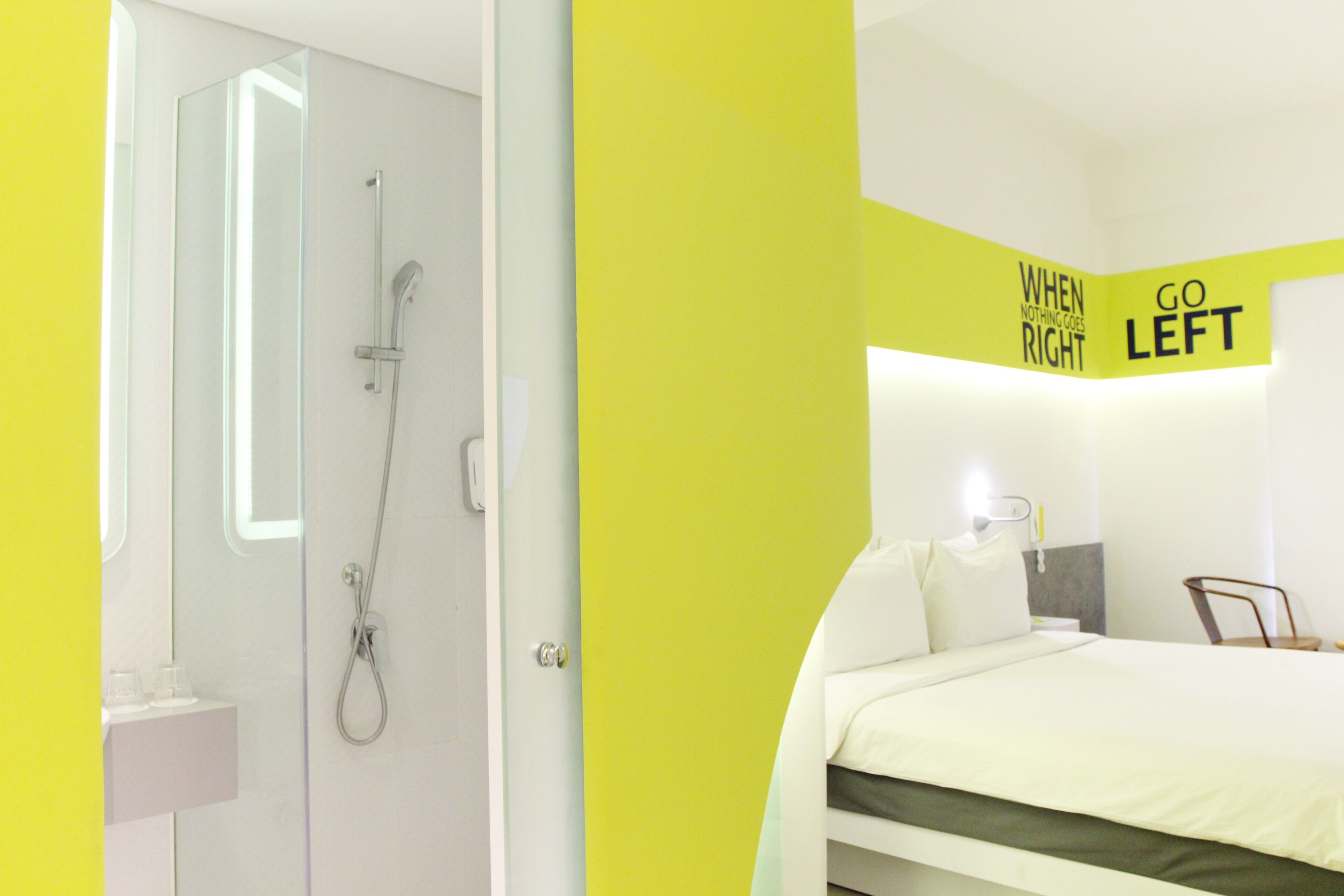 Room (Yello) | Bathroom | Shower, free toiletries, hair dryer, slippers
