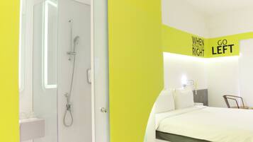 Room (Yello) | Bathroom | Shower, free toiletries, hair dryer, slippers