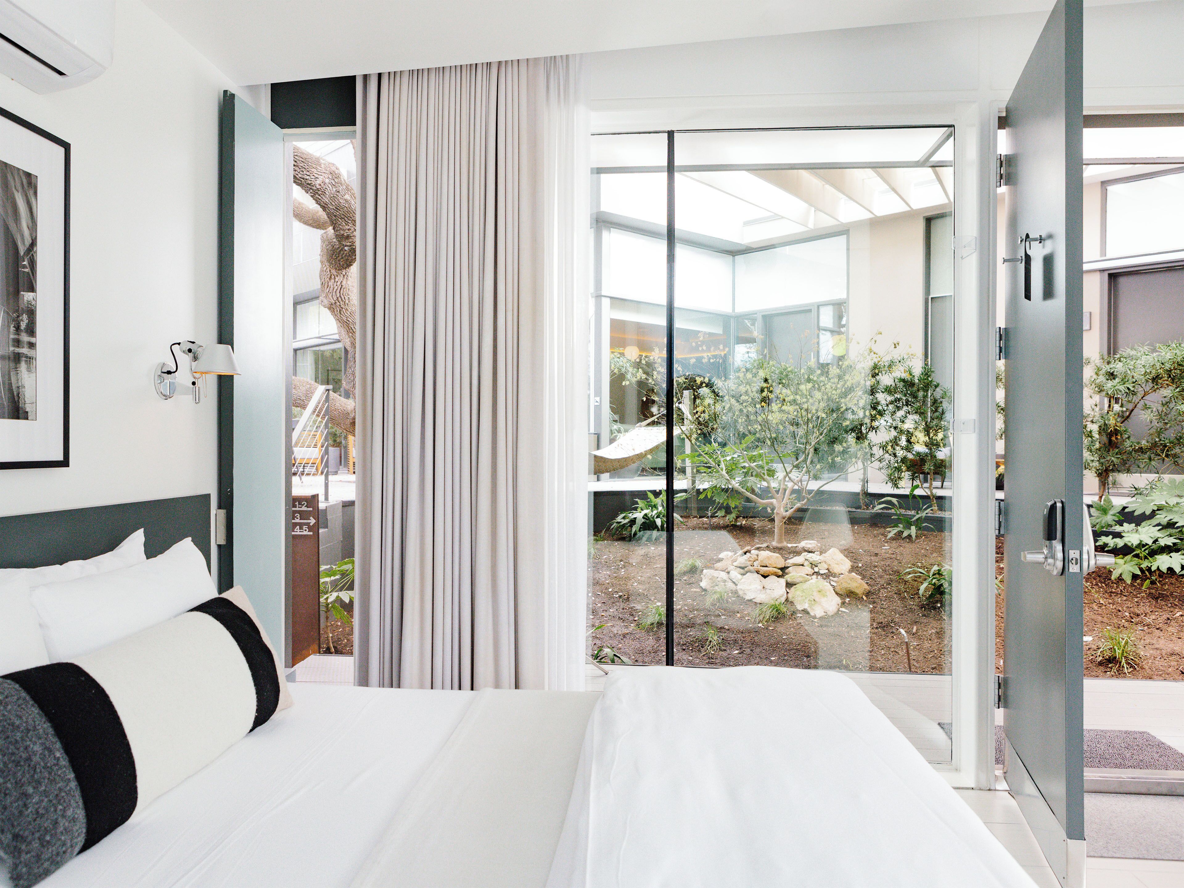 Luxury Room, 1 Queen Bed, Private Bathroom, Garden Area (Balcony) | Courtyard view