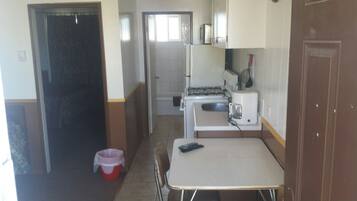 Fridge, microwave, cookware/dishes/utensils
