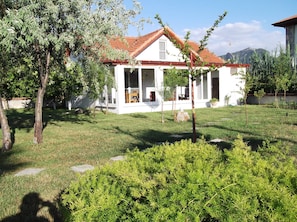 Sit on the porch and enjoy the serene surroundings.
