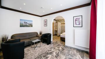 Deluxe Double Room (Balcony) | Living area | 32-inch flat-screen TV with satellite channels, TV