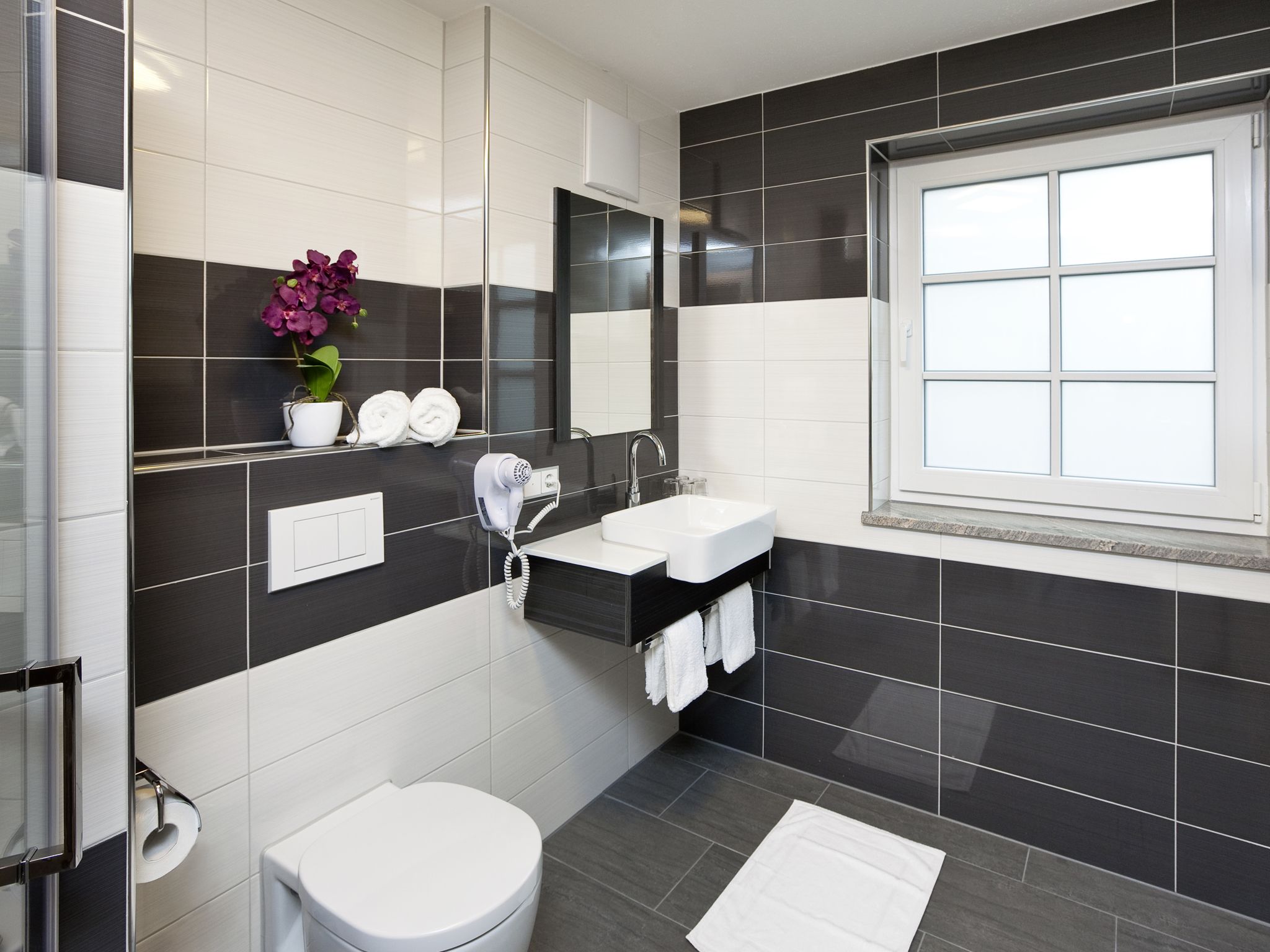 superior quadruple room | bathroom | hair dryer, towels, soap, shampoo