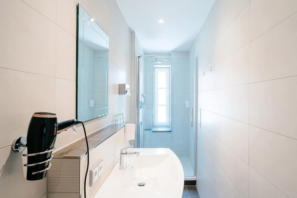 hair dryer, towels, soap, shampoo