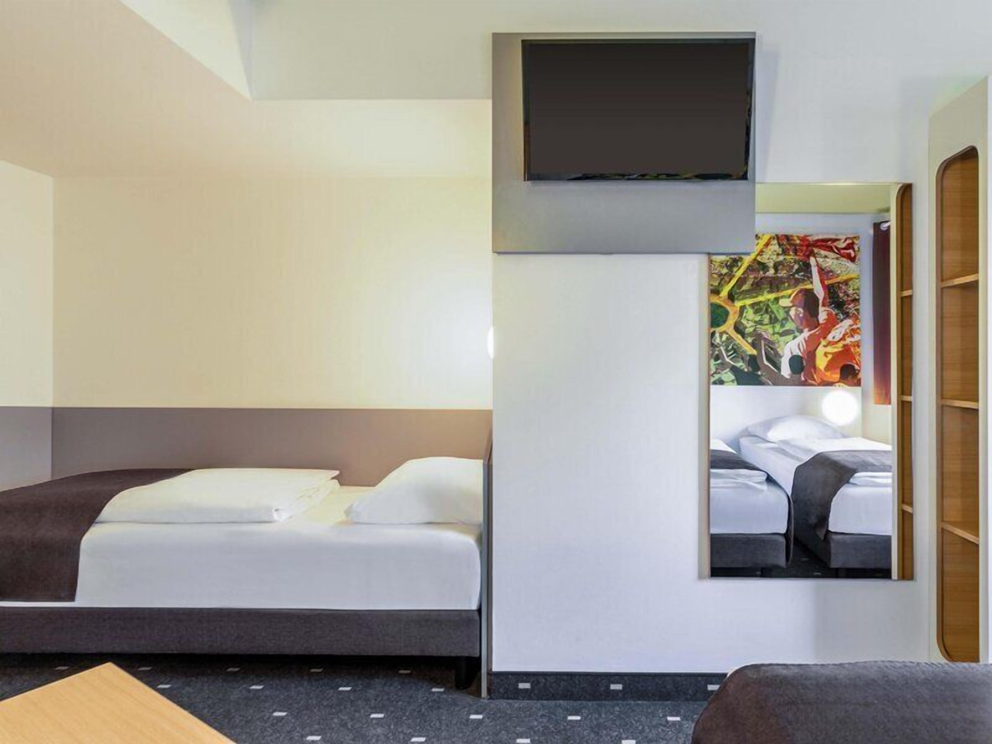 Dreibettzimmer | Schreibtisch, schallisolierte Zimmer, kostenloses WLAN, Bettwäsche
