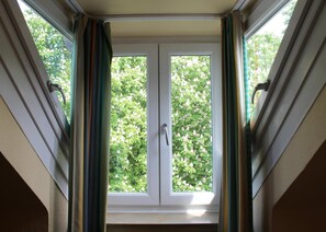 Premium bedding, down comforters, minibar, in-room safe