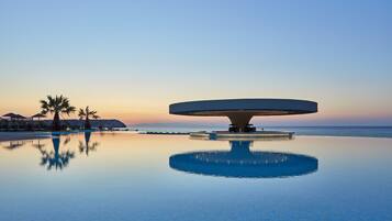 3 bars/lounges, swim-up bar, poolside bar