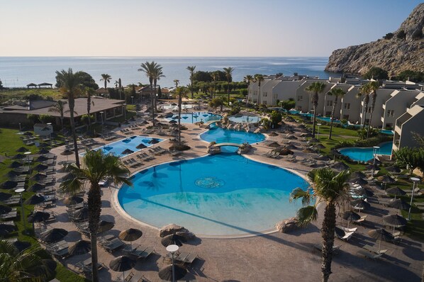 Seasonal outdoor pool, pool umbrellas, pool loungers