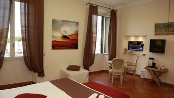 Family Room, City View | Living area | Flat-screen TV