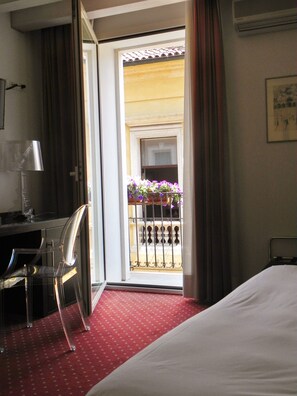 Luxe beddengoed, donsdekens, een minibar, een kluis op de kamer