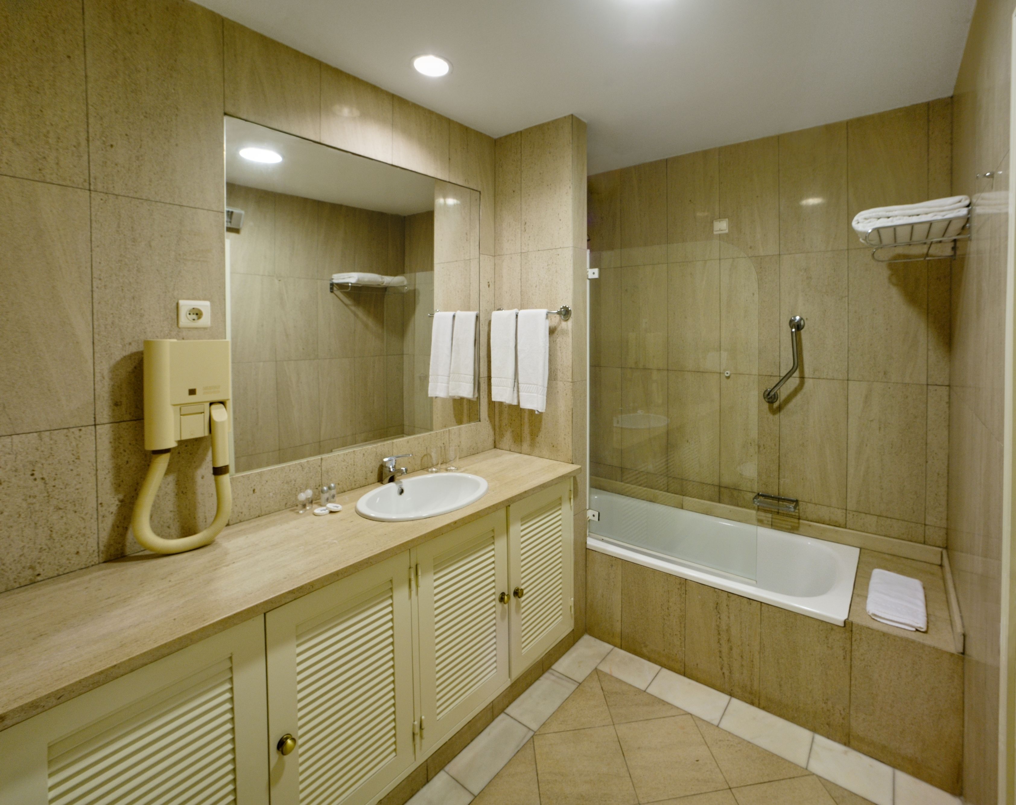 free toiletries, hair dryer, bidet, towels