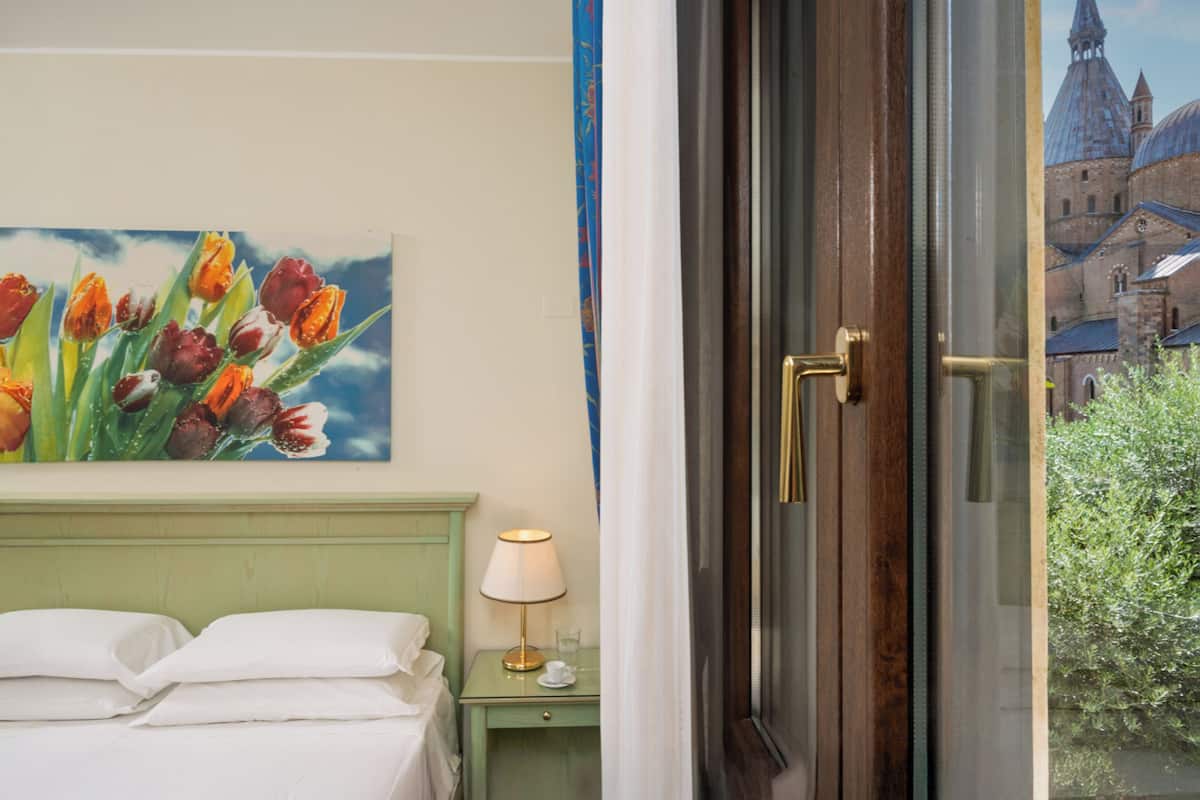 double or twin room, city view | 1 bedroom, down duvets, minibar, in-room safe