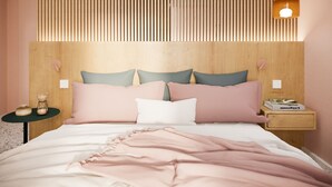 A bedroom with a wooden slat headboard, a bed with pink bedding, two bedside tables with lamps, and a nightstand with a book. - Asteria (Zakynthos)