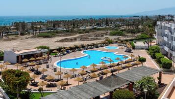 Relax by the pool overlooking the sea with a balcony and enjoy the tropical ambiance of the landscaped gardens.