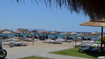 Private beach nearby, sun-loungers, beach umbrellas