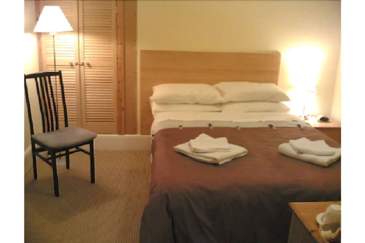 Desk, blackout curtains, iron/ironing board (on request), free WiFi