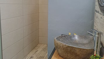 Shower, rainfall showerhead, hair dryer, towels
