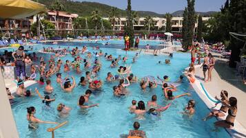 Indoor pool, outdoor pool, pool umbrellas, pool loungers