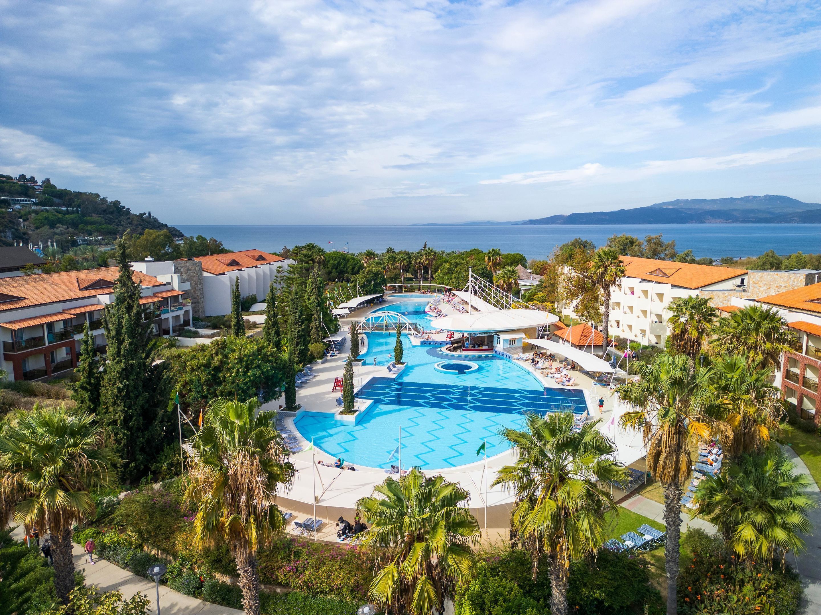 Indoor pool, outdoor pool, pool umbrellas, pool loungers