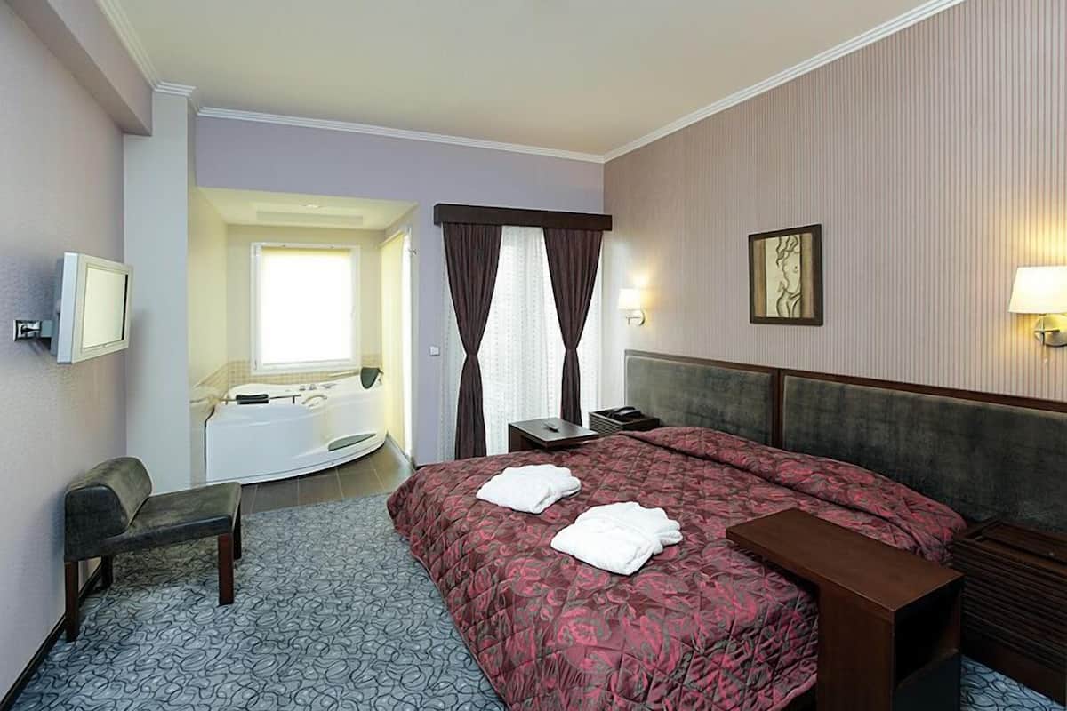 King Suite | Literie de qualité supérieure, minibar, coffres-forts dans les chambres