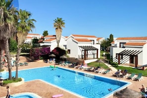 2 outdoor pools, open 10:00 AM to 7:00 PM, pool umbrellas, pool loungers