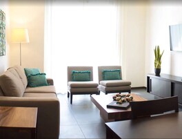 Deluxe Suite, 2 Bedrooms, Kitchen, City View | Premium bedding, in-room safe, desk, blackout drapes
