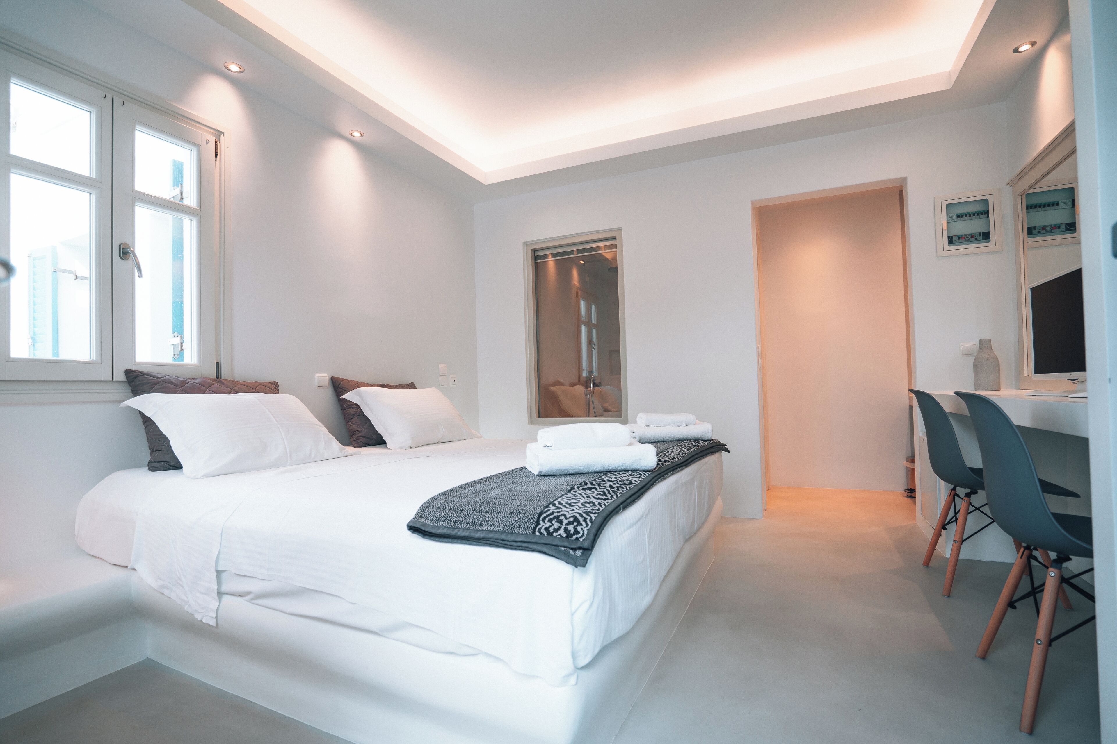 Habitación doble superior | Caja de seguridad en la habitación y tabla de planchar con plancha 