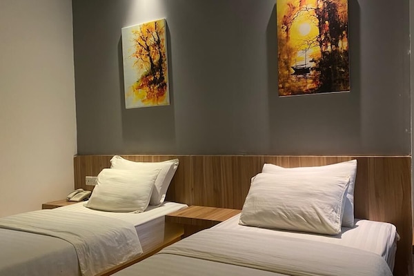 Deluxe Double or Twin Room, 2 Bedrooms | Desk, laptop workspace, blackout drapes, soundproofing
