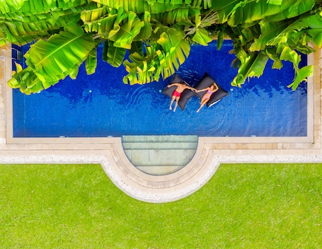 3 outdoor pools, cabanas (surcharge), pool umbrellas. Montigo Resorts Seminyak