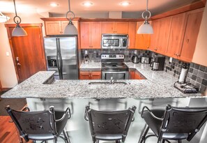 Panoramic Condo, 2 Bedrooms, Kitchen (Sun View - Top Floor) | Private kitchen | Full-size fridge, microwave, coffee/tea maker, freezer