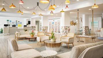 A spacious living area with multiple seating options, a central coffee table, and a variety of hanging lamps.