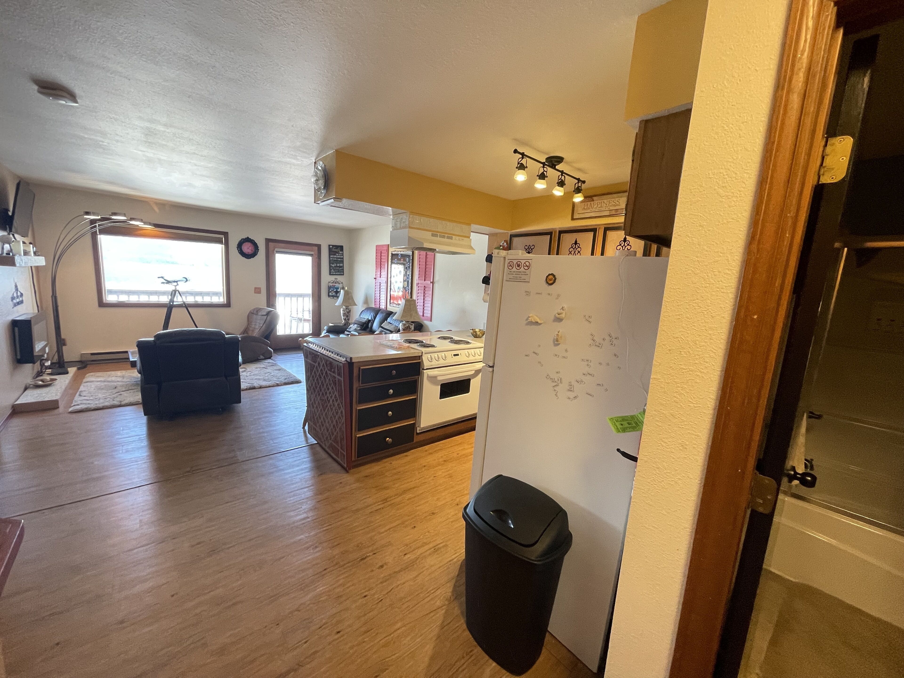 Suite, 2 Bedrooms | Living area | TV, fireplace