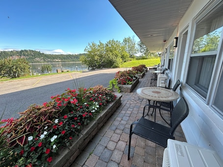 Economy Room, 2 Queen Beds, River View | Balcony view. Motel Panoramique