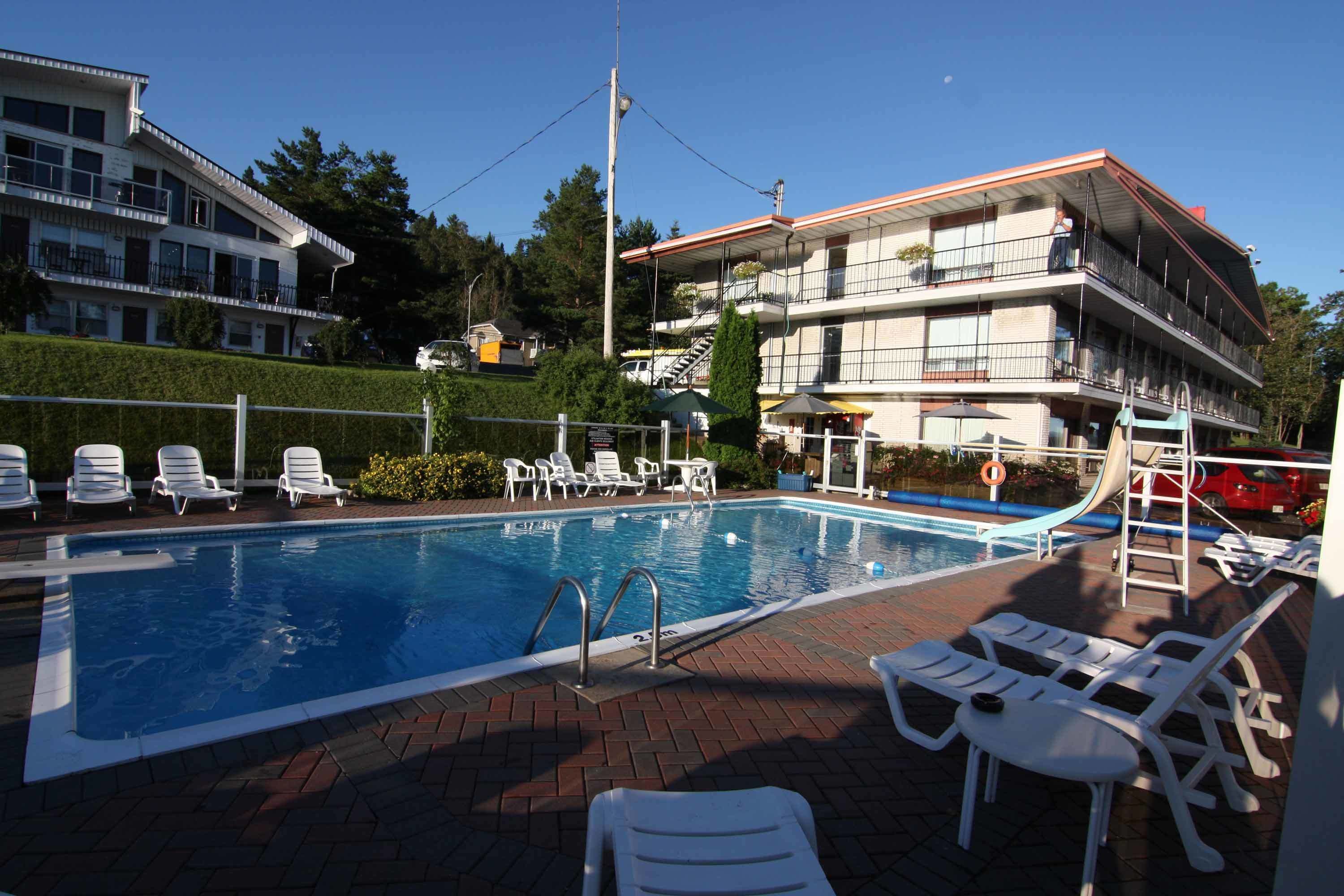 Seasonal outdoor pool, open 8:00 AM to 10:00 PM, sun loungers